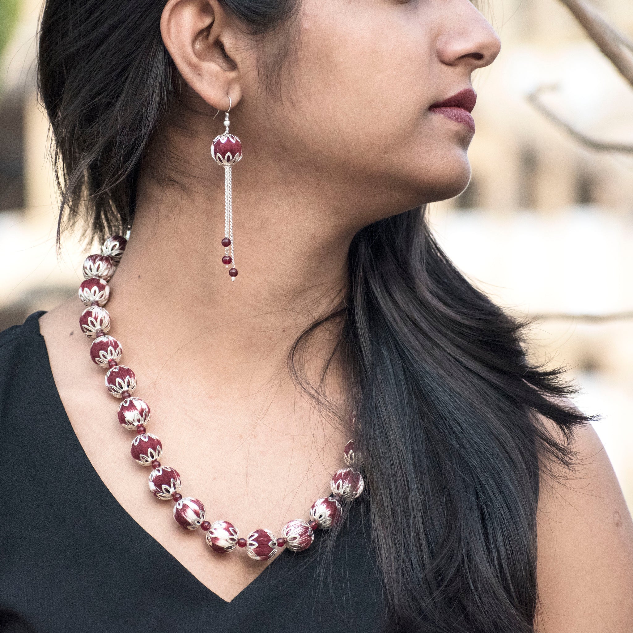 Handcrafted maroon ikat beaded necklace and earrings set
