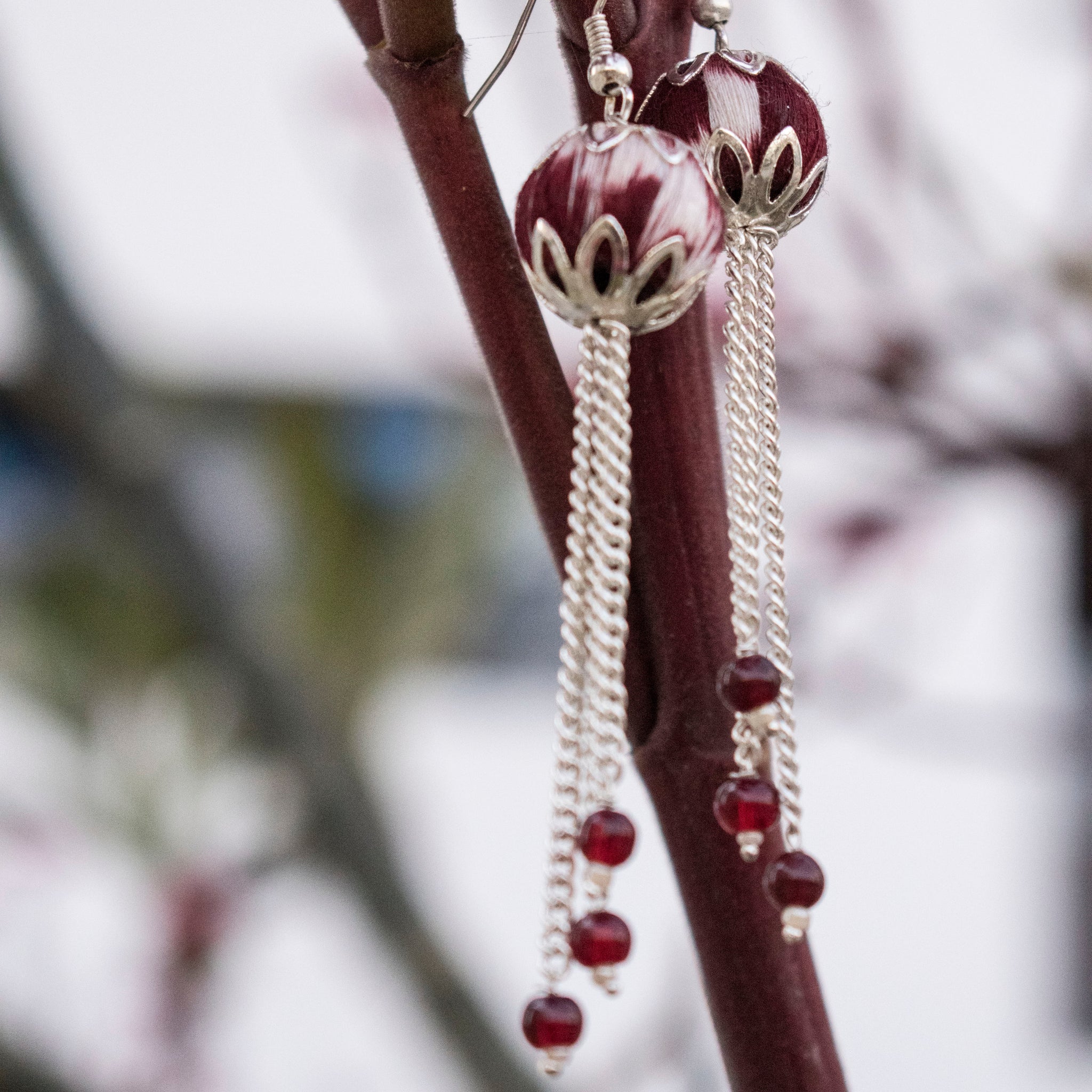 Handcrafted maroon ikat beaded earrings