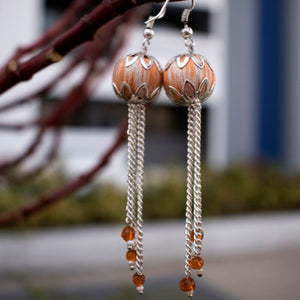 Handcrafted orange ikat beaded earrings 