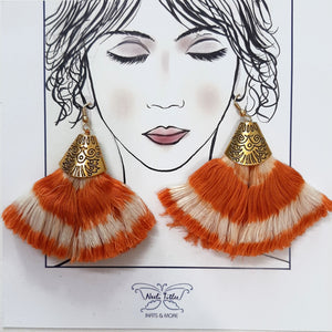 Handcrafted Bohemian style orange ikat tassel earrings with metal clasp