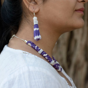 Handmade jewellery set of Maharani purple cotton ikat necklace with metallic chain adjuster and tassel earrings